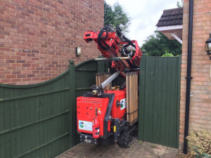Microdrill on its way into a back garden to drill holes to locate mine workings 
